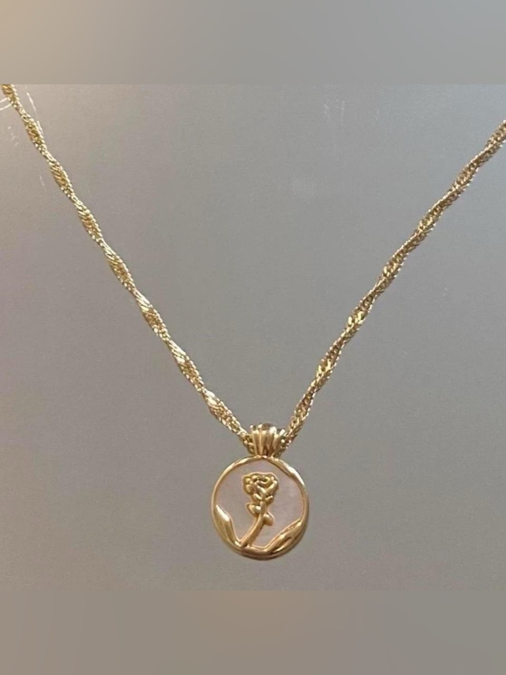 Gold stainless steel rose pendant necklace